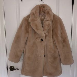 Faux fur. Super soft! Only worn once!